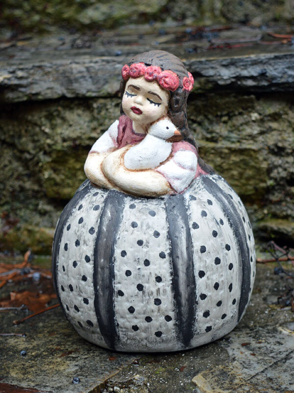 Handmade ceramic girl with pigeon