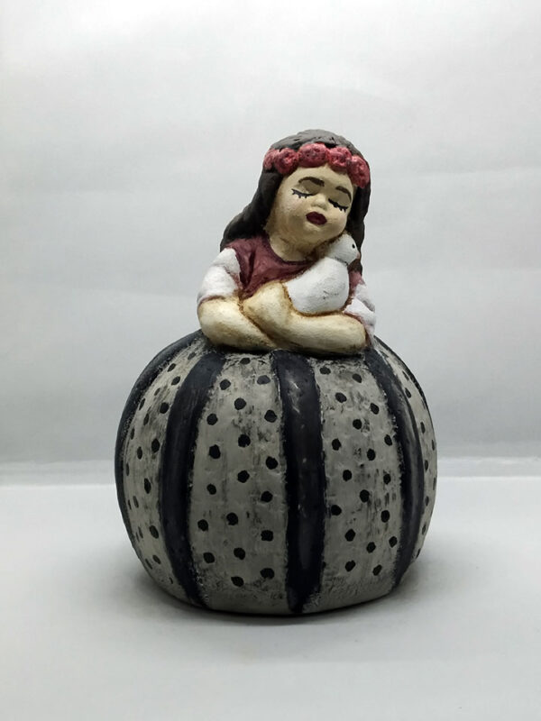 Handmade ceramic girl with pigeon