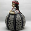 Handmade ceramic girl with pigeon