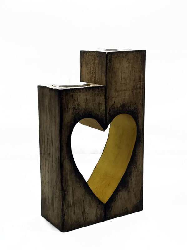 Handmade wooden candlestick in the shape of a heart