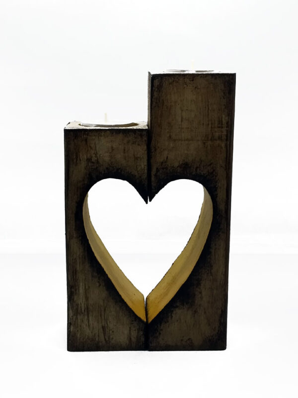 Handmade wooden candlestick in the shape of a heart