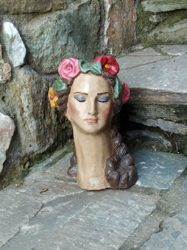 Handmade ceramic bust with flowers