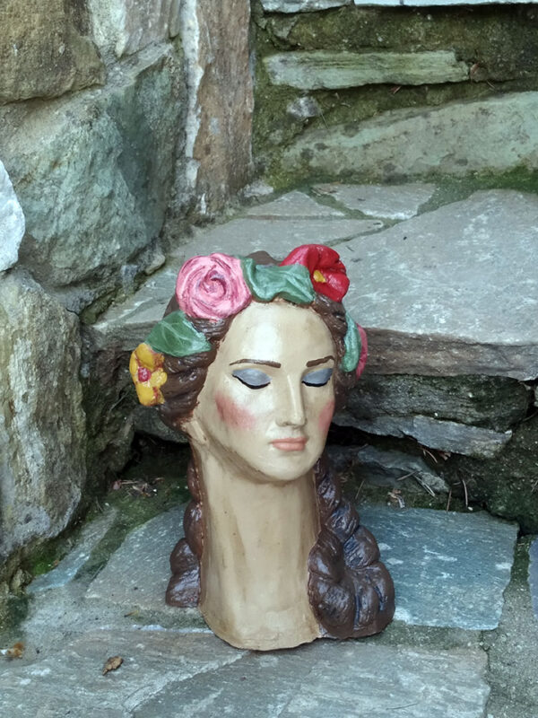 Handmade ceramic bust with flowers