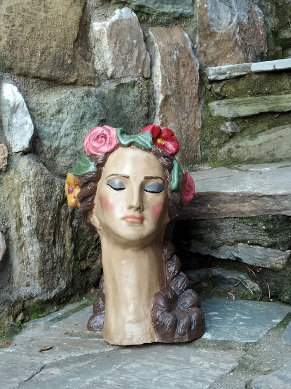 Handmade ceramic bust with flowers