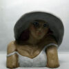 Handmade ceramic bust with an impressive hat