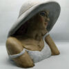 Handmade ceramic bust with an impressive hat