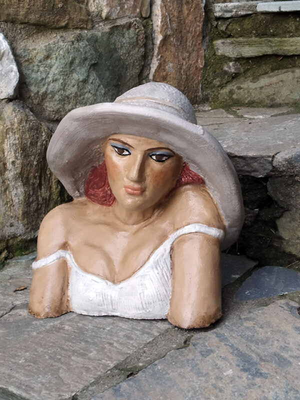 Handmade ceramic bust with an impressive hat