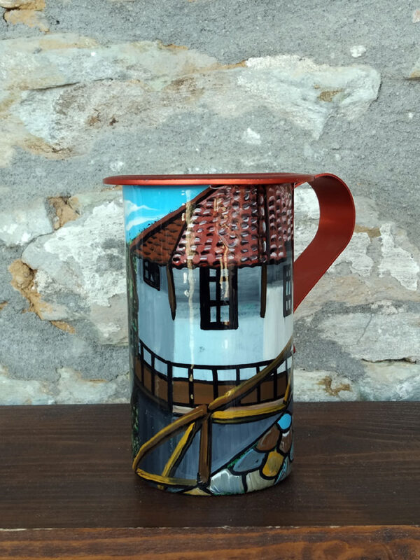 Handmade jug painted by hand