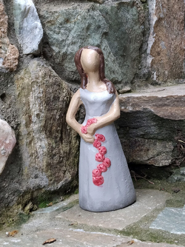 Handmade ceramic decorative dancer with flowers