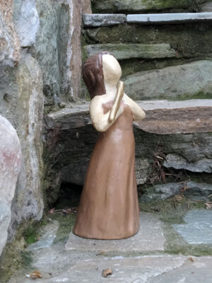 Handmade ceramic decorative dancer with flute